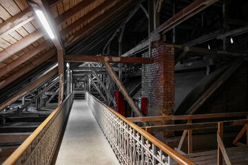 Beautifully ornate metal railing in the attic of the building.
