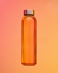 Orange water shaker. Health and sports.