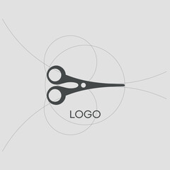 The scissors logo is based on circles. Golden Ratio. Logo of haberdashery, workshop, sewing. 