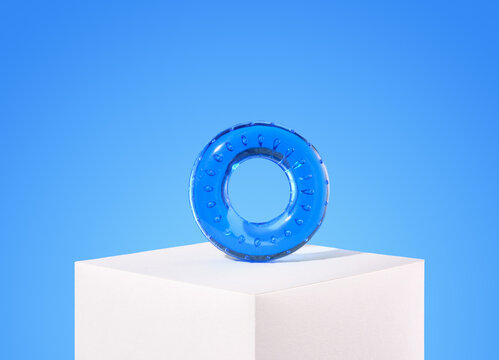 Round hand espander blue color. Health and sports.