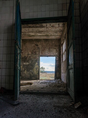 door exit from an abandoned bomb shelter after the bombing in Ukraine