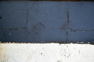 Weathered iron wall with seamless background of iron products