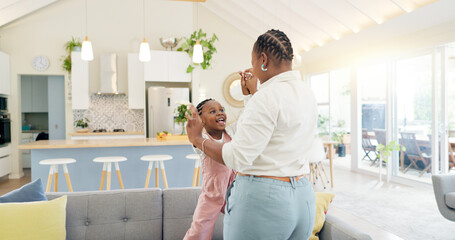 Excited mom, child and dancing in living room with happiness, energy and bonding in home together....
