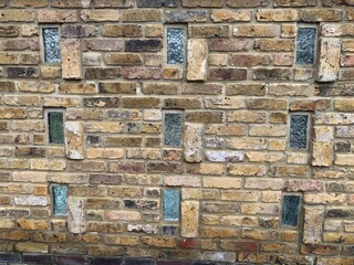 Brick wall with glass