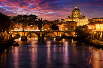Fototapeta na wymiar Saint Peter's Basilica with Sant' Angelo's Bridge Over Tiber At Sunset, Rome, Lazio, Italy