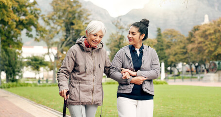 Fototapeta premium Senior woman, walker and nurse outdoor in a park with healthcare for elderly exercise. Walking, healthcare professional and female person with peace and physical therapy in a public garden with carer