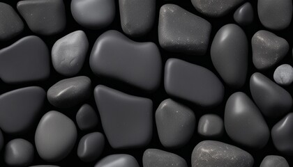 Fototapeta na wymiar A pile of dark grey rocks