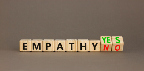 Empathy yes or no symbol. Concept words Empathy no to Empathy yes on beautiful wooden cubes....