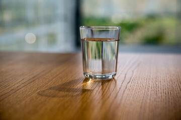 Water glass, water, holding a water glass