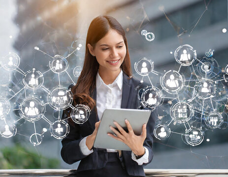 Human resource management, Businesswomen use tablets to show effective organizational structure effective management and recruitment, leadership and teambuilding, Strategy target of business growth.