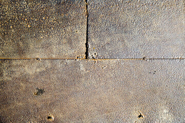Weathered iron wall with seamless background of iron 