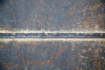 Weathered iron wall with seamless background of iron 