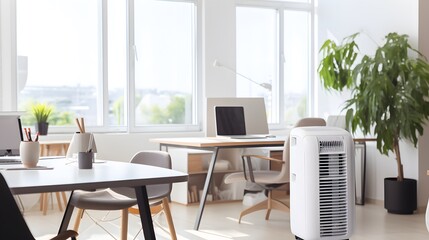 Portable mobile air conditioner in office interior.
 - obrazy, fototapety, plakaty