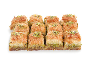 Delicious fresh baklava with chopped nuts isolated on white. Eastern sweets