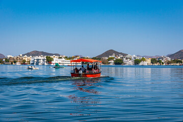 Mesmerizing view of Pichola Lake situated in the city of Udaipur, Rajasthan, India. It is an artificial lake popular for boating among tourist who visits City of lakes to enjoy vacations.