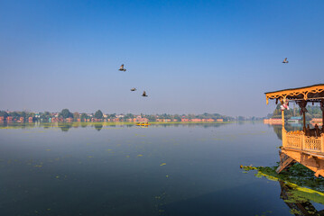 View of pristine Nigeen Lake which is connected to Dal Lake in Srinagar, India. It is a popular...