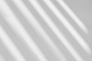 Gray shadow and light blur abstract background on white wall  from window. Dark stripe grey shadows...