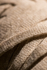 macro view of woven cotton ball shaped fabric