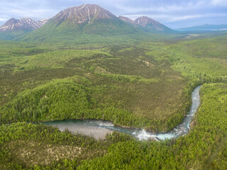 Lake Clark National Park in Alaska. Tanalian Falls and Tanalian Mountain and river. Aerial view of spruce trees, rugged mountains and popular day hike area near Port Alsworth.