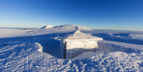 View of the memorial to the victims of the mountains at sunset, the Giant mountains.