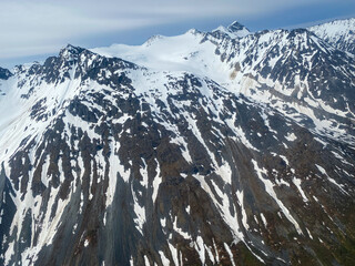 Mount Redoubt at Lake Clark National Park in Alaska. Aerial view of Redoubt Volcano an active stratovolcano and highest summit in Aleutian Range. 