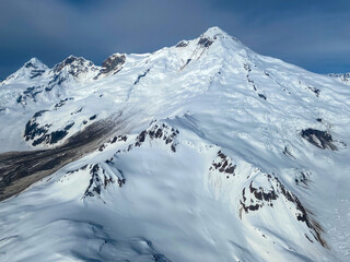 Iliamna Volcano summit and head of Red Glacier. Lake Clark National Park in Alaska. Glacier-covered...