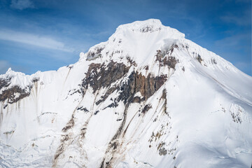 View of southeast flank of Iliamna Volcano showing debris avalanche deposits from 1997, fumarole...