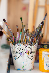 Assorted Paintbrushes in Artist's Studio