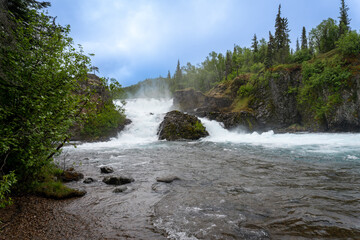 Lake Clark National Park in Alaska. Tanalian Falls and river. Spruce trees, rugged mountains and popular day hike area near Port Alsworth.