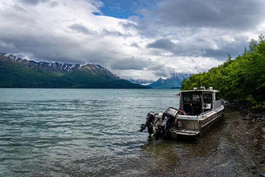 Lake Clark National Park, Alaska: Shoreline on southwest shore of Lake Clark near Little Lake Clark at Tlikakila River inlet. Aluminum  Almar fishing boat with outboard motors. 