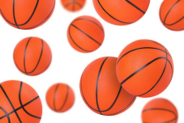 Obraz premium Many basketball balls falling on white background