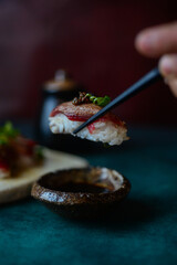 sushi with chopsticks