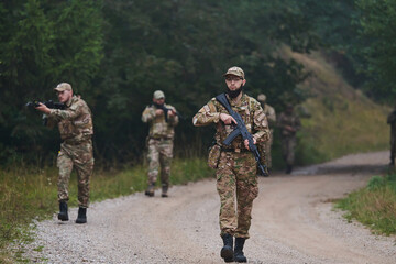Naklejka premium A disciplined and specialized military unit, donned in camouflage, strategically patrolling and maintaining control in a high-stakes environment, showcasing their precision, unity, and readiness for