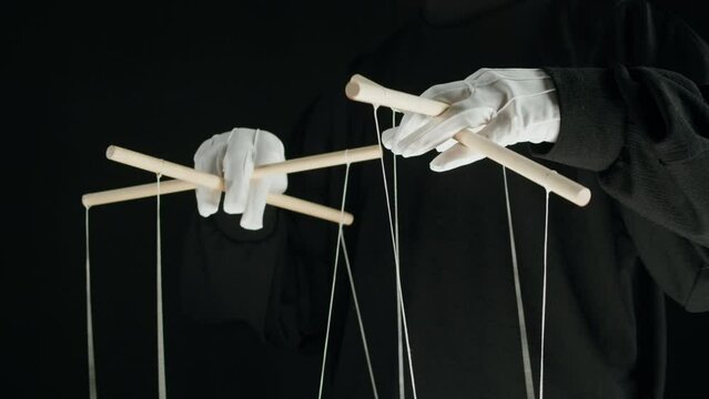 The puppeteer controls the puppets in the theater. Managing people at work, in politics and government. Action control