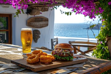 Gastronomic Delight in Mykonos: Relish a Rustic Pork Burger Experience with Crispy Onion Rings on a Wooden Board and a Cold Beer, Overlooking the Azure Aegean Sea.