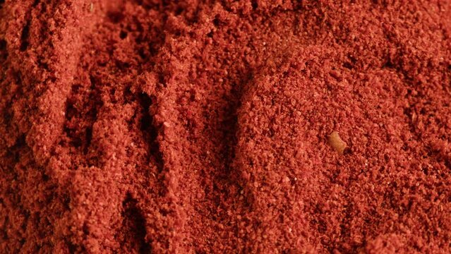 Dried red paprika close-up macro. Red exotic sweet spice additive for food.