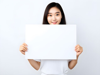 Naklejka premium a young girl showcasing a blank white board, creating a heartwarming advertisement with empty space for a message,Generative Ai