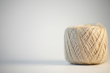 Grey ball of threads wool yarn isolated on white background