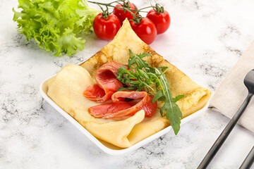 Russian pancake with salmon fish