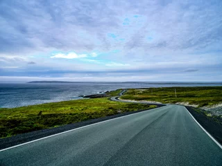 Papier Peint photo Atlantic Ocean Road The desolate and empty coastal road to the Cape Race Lighthouse on Canadas most easterly point