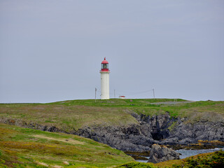 Fototapeta na wymiar The Cape Race Lighthouse on the rocky and desolate coast of Canadas most easterly point on the island of newfoundland