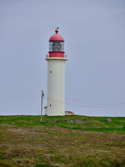 Fototapeta na wymiar The Cape Race Lighthouse on the rocky and desolate coast of Canadas most easterly point on the island of newfoundland