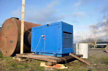 Fototapeta na wymiar Diesel generator. Emergency generator for uninterrupted power supply.