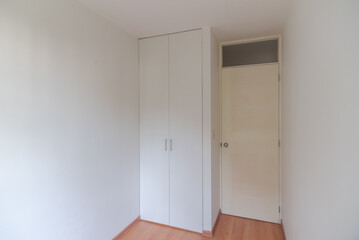 Fototapeta na wymiar interior of room with white closet
