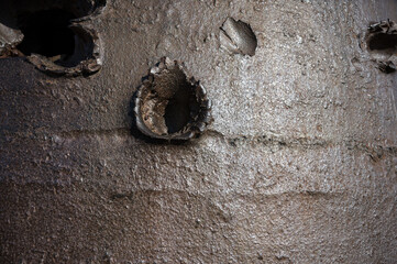 Detail of bullet and projectile holes in the armored bell-type defensive fortification.GFM Guetteur...