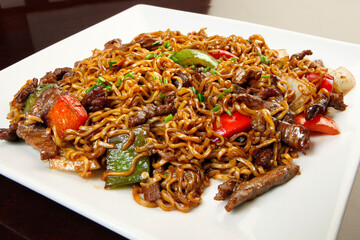 Asian cuisine. Fried noodles with vegetables 