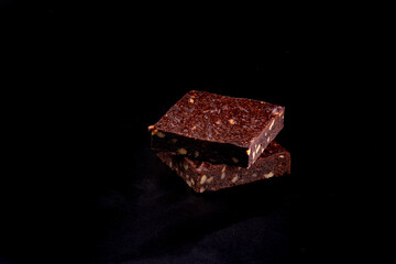 chestnut brownie isolated on black background