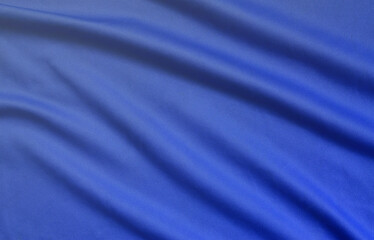 Detailed polyester blue fabric texture with many long folds - obrazy, fototapety, plakaty