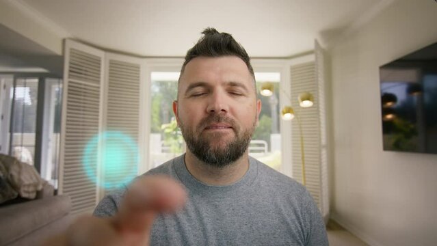 Stylish bearded man tapping screen on modern touchscreen device web camera view. Close Up interface interactions, augmented reality concept. Animated graphic button clicks, calling number on phone 4K
