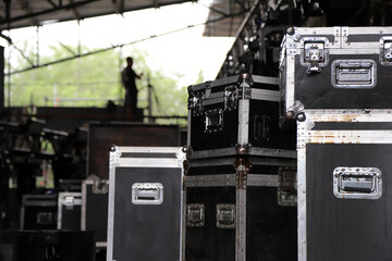 Trunks for technical equipment for events. Technician working. Drawers for carrying equipment for...